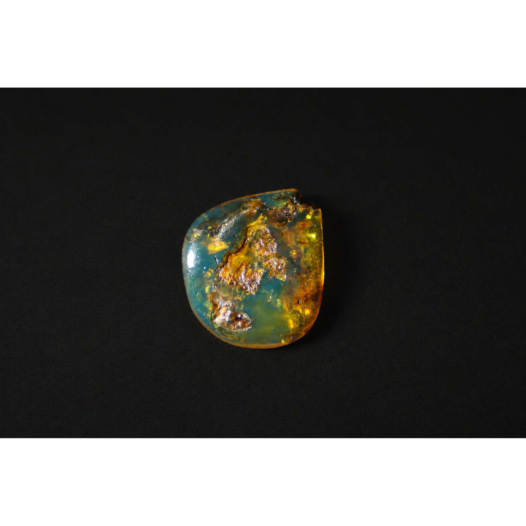 Clear royal blue Natural Dominican Amber teardrop Polished Stone 24 mm – photo 4
