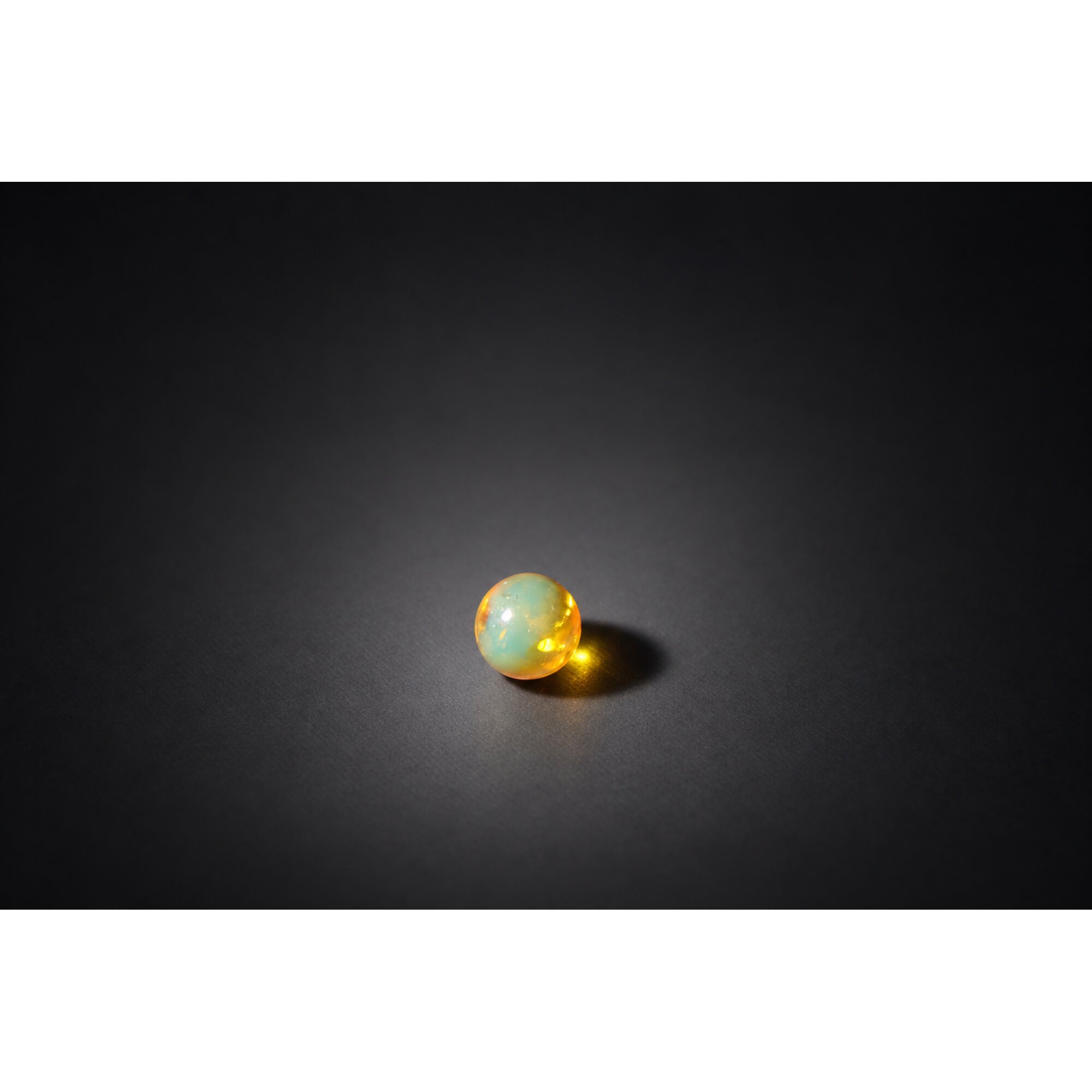 Natural light blue Dominican amber sphere/ball 10.5mm – photo 3