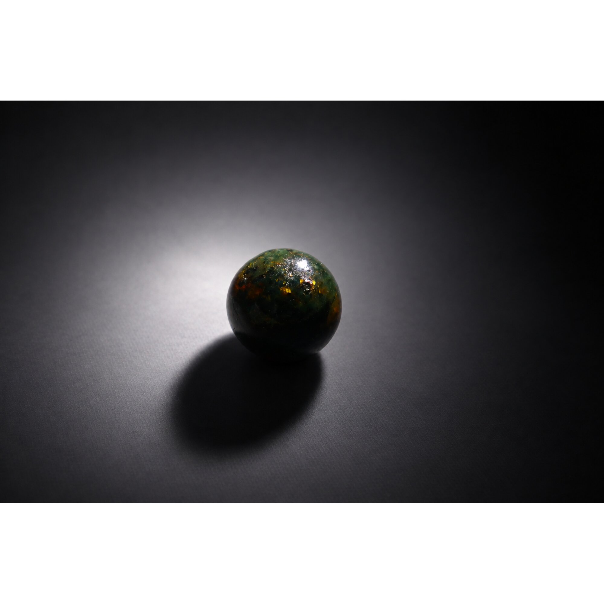 Untreated olive green blue Dominican amber sphere/ball 20mm – photo 5