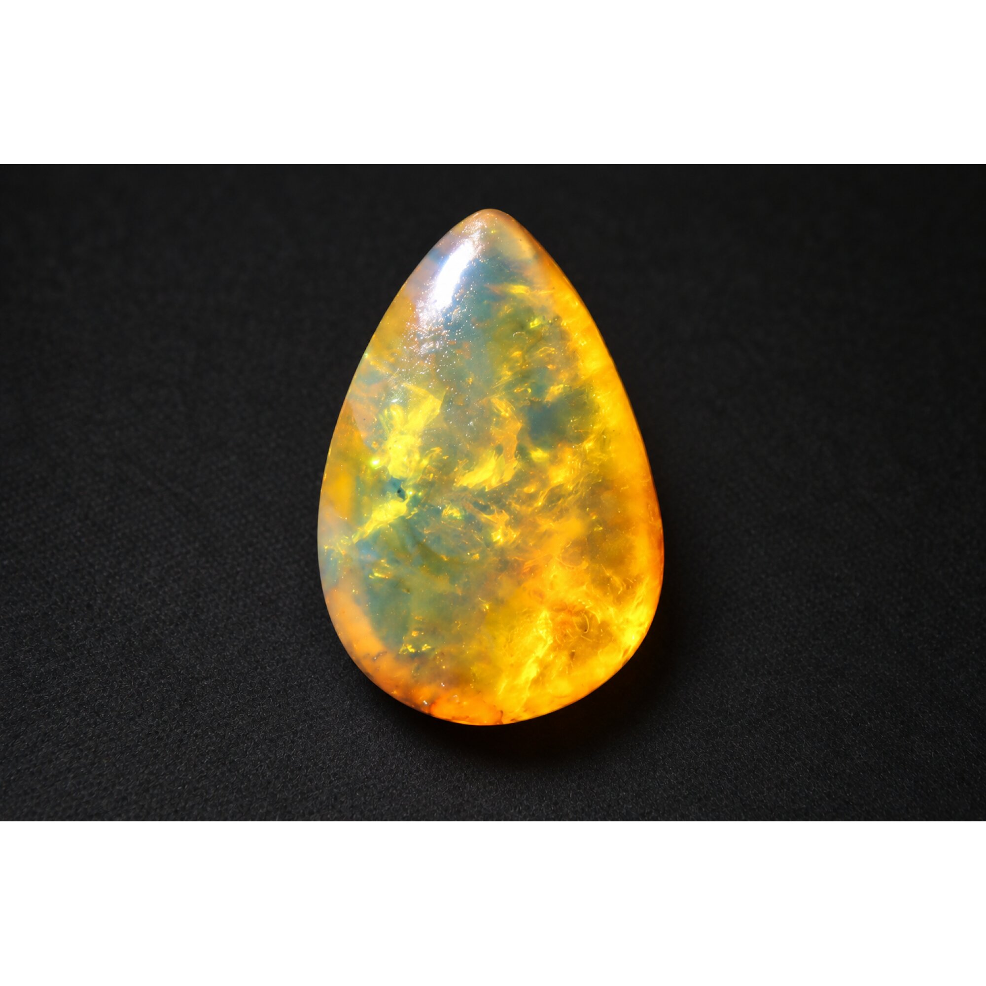 Pure natural orange blue polished Dominican amber 2.1g – photo 2