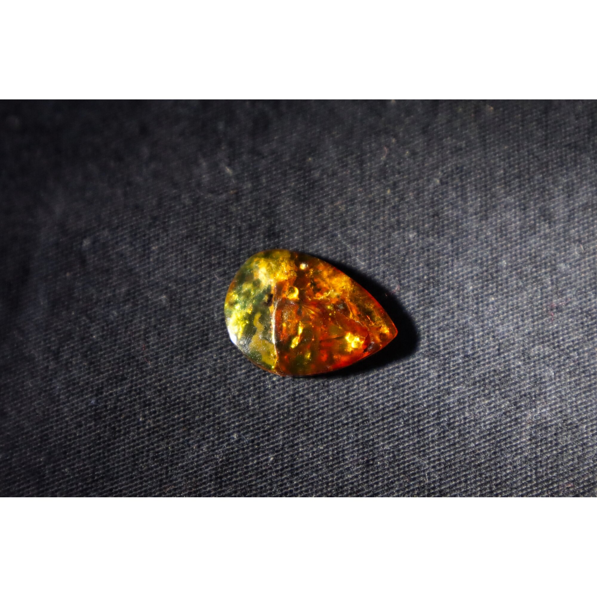 Natural yellow brown Dominican amber cabochon – photo 9
