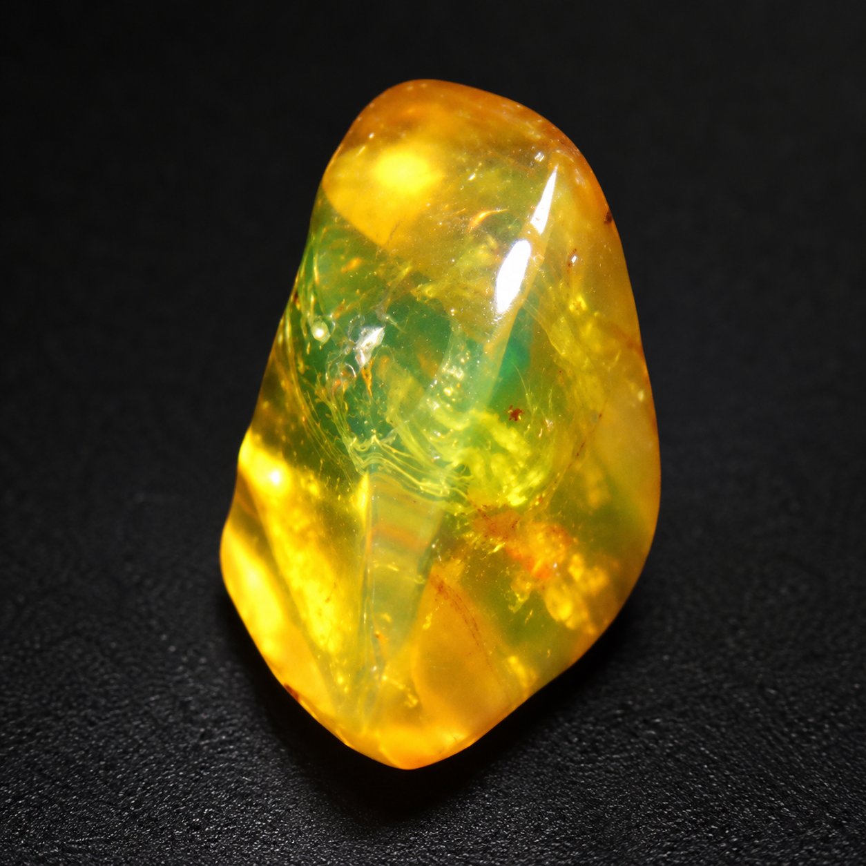 Authentic yellow green polished Dominican amber 29mm