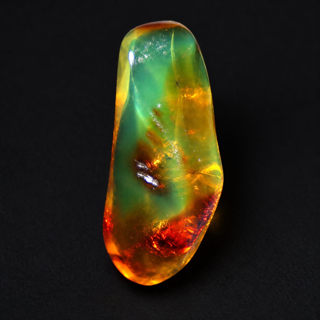 Real dark green polished Dominican amber 35mm – photo 10
